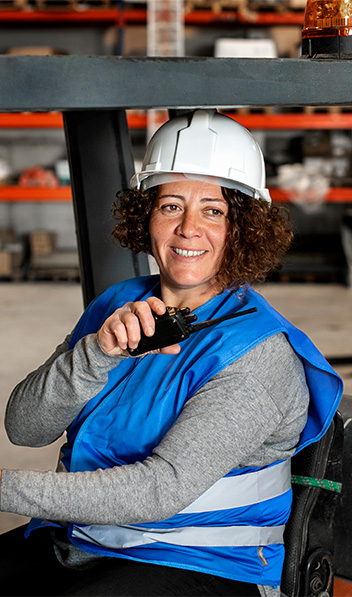 professional-female-driver-operating-forklift-vehicle